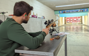 Precision shooting session focusing on firearm safety and handling