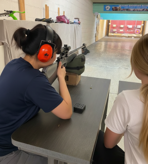 Precision shooting session focusing on firearm safety and handling