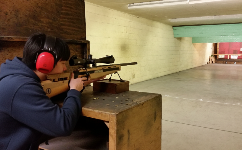 Precision shooting session focusing on firearm safety and handling
